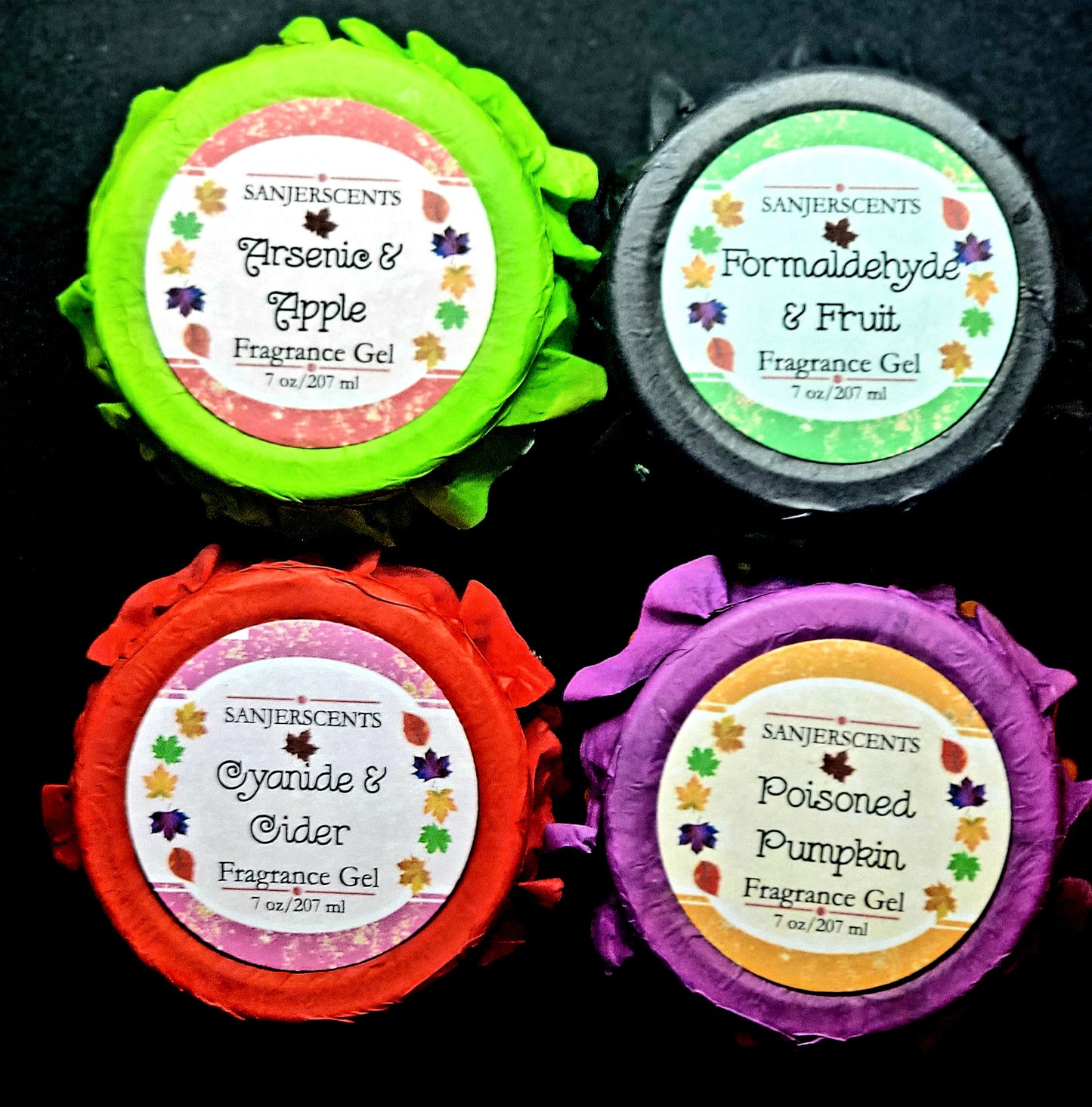 Group of 4 Frightening Fragrance Gels in 7 oz size with metal lids and colorful toppers.